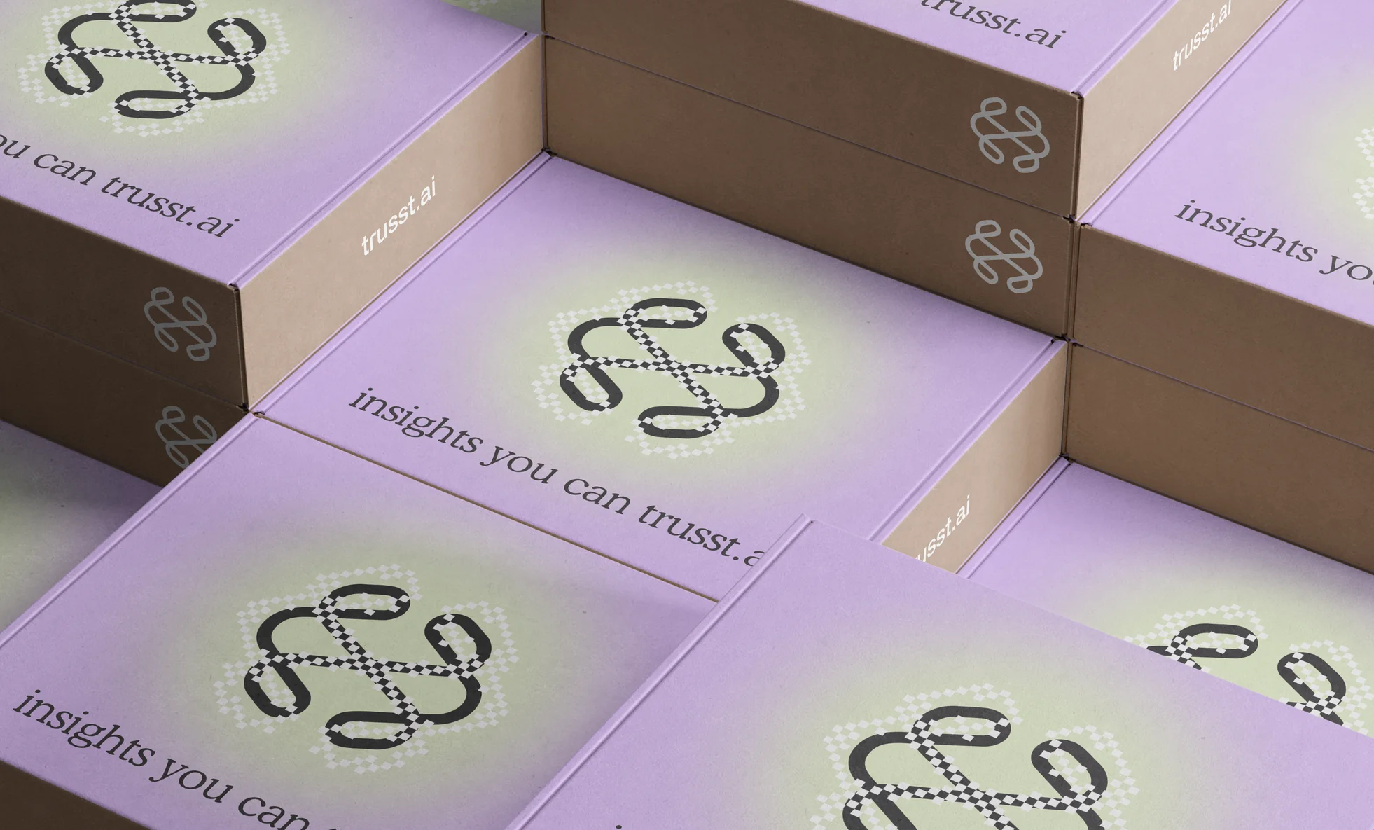 Stacked lilac and kraft shipping boxes