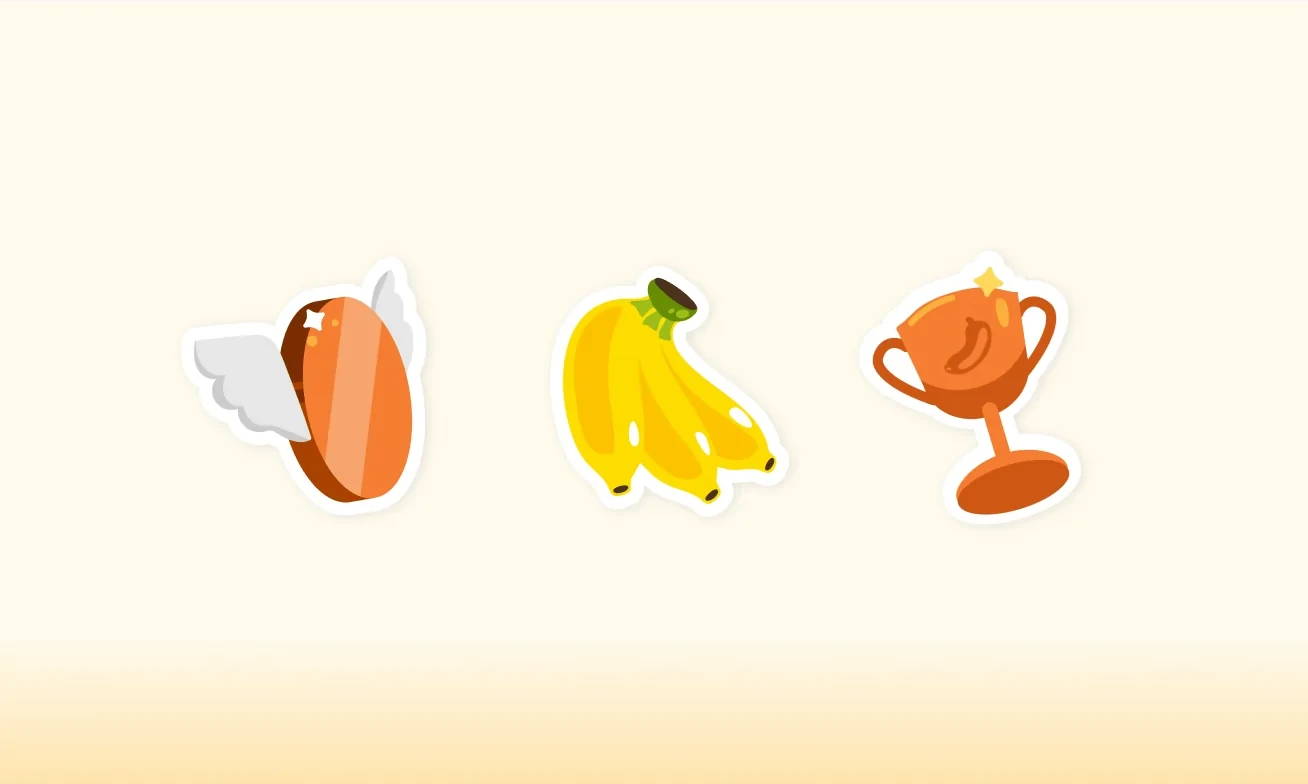 The sticker set: a winged coin, bananas and a trophy